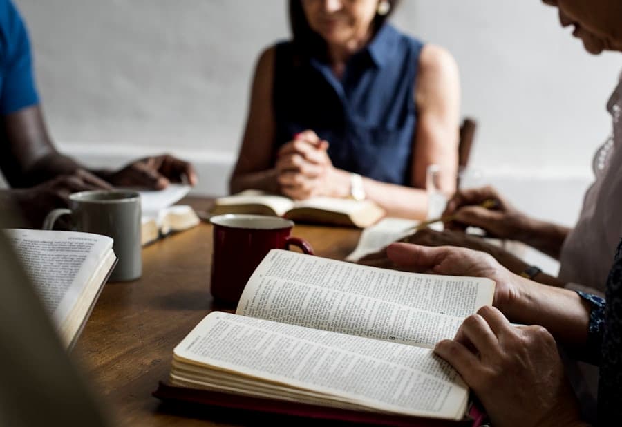 A person reading the Bible in a quiet and reflective setting.